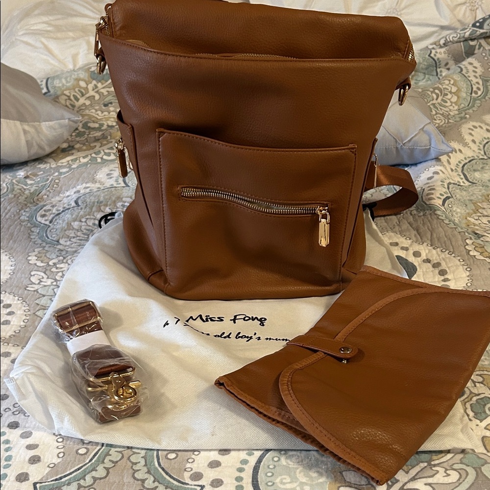 Barely used Miss Fong Brown Leather Backpack or diaper bag